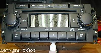 NEW 2004-2007 DODGE DURANGO MP3 RADIO 6 DISC CD CHANGER WORKS WITH RSE REAR DVD